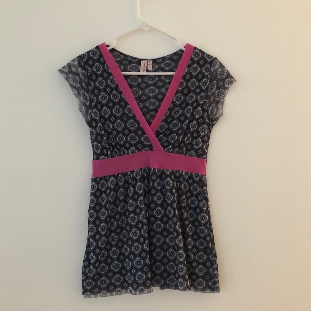 Women’s size medium sweet pea peplum shirt